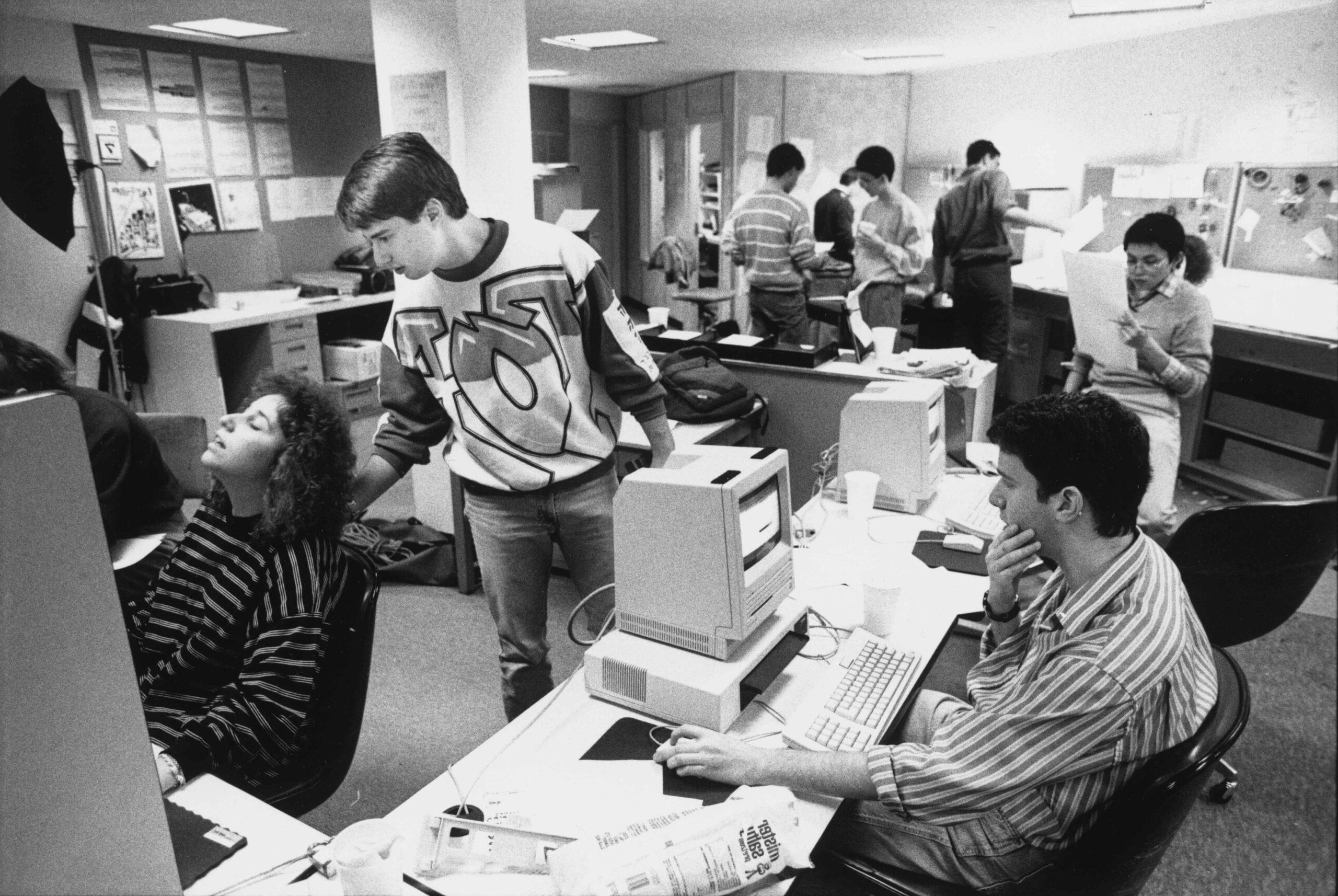 student staff working at computers