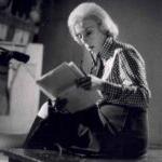 Anne Keefe, seen reading papers